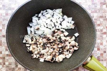Сибас, запечённый в фольге, с грибами в духовке 